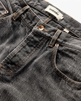 material shot of the button fly on The Democratic Jean in Black 1-Year Wash Selvage Denim, closed, Bottoms by Taylor Stitch