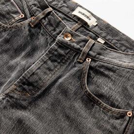 material shot of the button fly on The Democratic Jean in Black 1-Year Wash Selvage Denim, closed
