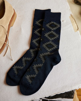 The Crew Sock in Navy Kilim on table, Accessories by Taylor Stitch