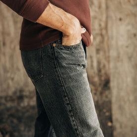 fit model standing in The Democratic Jean in Black 1-Year Wash Selvage Denim