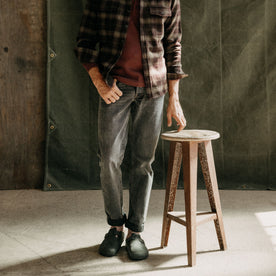 fit model showing the front of The Democratic Jean in Black 1-Year Wash Selvage Denim