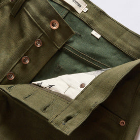 material shot of the button fly on The Slim Jean in Olive Nihon Menpu Selvage