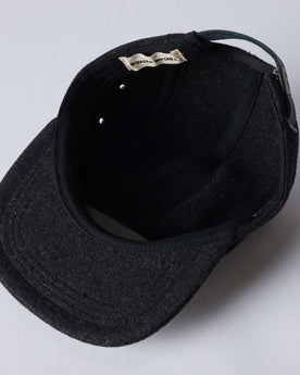 editorial image of the inside of The 5-Panel Cap in Heather Coal Wool Blend, Accessories by Taylor Stitch