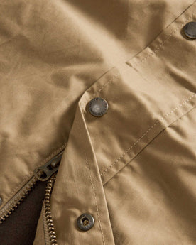 material shot of the buttons on The Deck Jacket in Khaki Dry Wax, Outerwear by Taylor Stitch