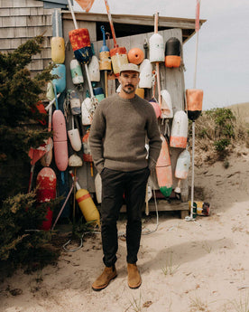 fit model with his hands in his pockets wearing The Fisherman Sweater in Taupe Merino, Knits by Taylor Stitch