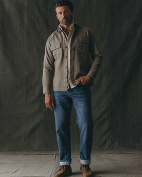 fit model posing in The Shop Shirt in Stone Chipped Canvas, Wovens by Taylor Stitch