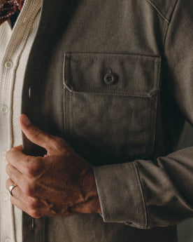 fit model showing off the shoulder on The Shop Shirt in Stone Chipped Canvas, Wovens by Taylor Stitch
