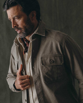 fit model showing off the details on The Shop Shirt in Stone Chipped Canvas, Wovens by Taylor Stitch