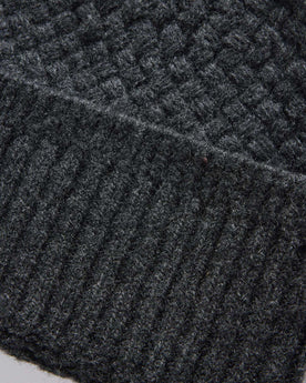 material shot of the cuff on The Textured Knit Beanie in Heather Coal Merino, Accessories by Taylor Stitch