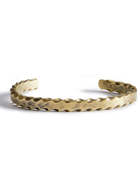 material shot of the front of The Twisted Cuff in Brass, Accessories by Taylor Stitch