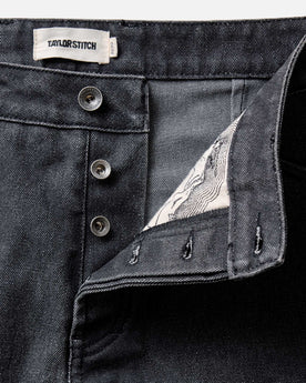 fit model posing in The Camp Pant in Coal Chipped Canvas, Bottoms by Taylor Stitch