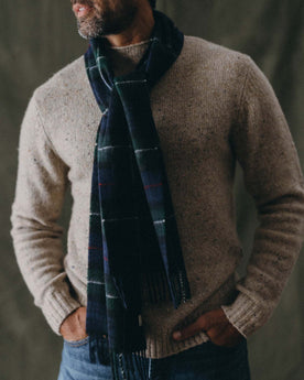 fit model posing in The Fireside Scarf in Highland Navy Plaid, Accessories by Taylor Stitch