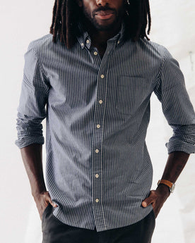 fit model with his hands in his pockets wearing The Jack in Rinsed Indigo Stripe, Wovens by Taylor Stitch