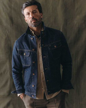 fit model posing in The Long Haul Jacket in Rinsed Organic Selvedge, Outerwear by Taylor Stitch