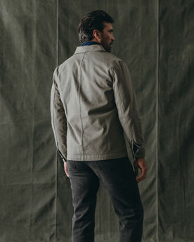fit model buttoning up The Ojai Jacket in Organic Smoked Olive Foundation Twill, Outerwear by Taylor Stitch
