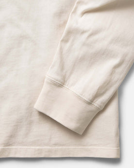 material shot of the sleeve on The Organic Cotton Long Sleeve Tee in Vintage White, Knits by Taylor Stitch