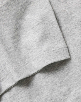 material shot of the sleeve on The Organic Cotton Tee in Heather Grey, Knits by Taylor Stitch