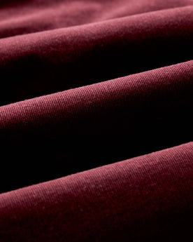 material shot of the fabric on The Jack in Heather Burgundy Pincord, Wovens by Taylor Stitch