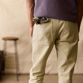 fit model showing the back of The Camp Pant in Light Khaki Chipped Canvas