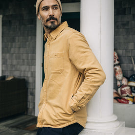 fit model with his hands in the pocket of The Lined Utility Shirt in Wheat Denim