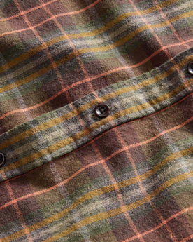 material shot of the dark horn buttons on The California in Tarnished Brass Plaid, Wovens by Taylor Stitch