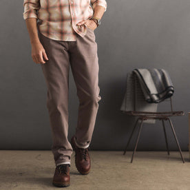 fit model sitting in The Democratic All Day Pant in Silt Broken Twill