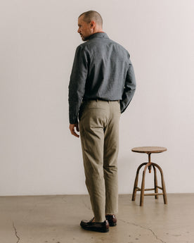 fit model sitting wearing The Jack in Dark Navy Houndstooth, Wovens by Taylor Stitch