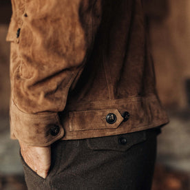 fit model showing the button back tab adjustment on The James Jacket in Vintage Tan Suede