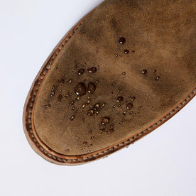 material shot of The Ranch Boot in Golden Brown Waxed Suede with water droplets on the suede