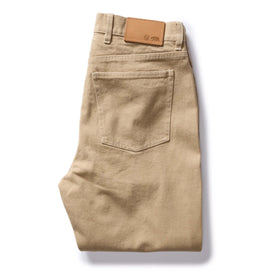 flatlay of The Slim All Day Pant in Light Khaki Broken Twill, folded from back