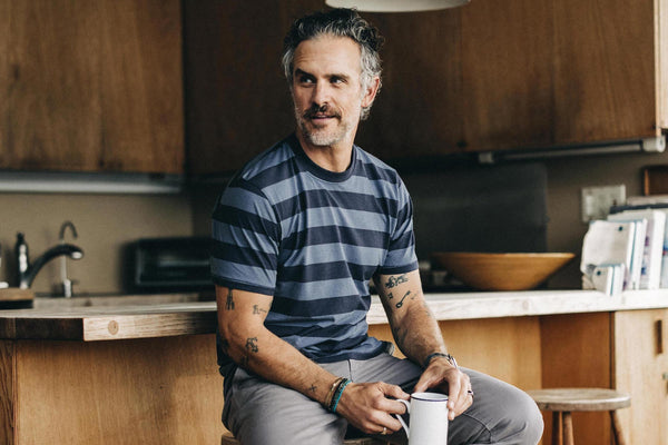 Model wearing The Cotton Hemp Tee in Storm and Navy Stripe