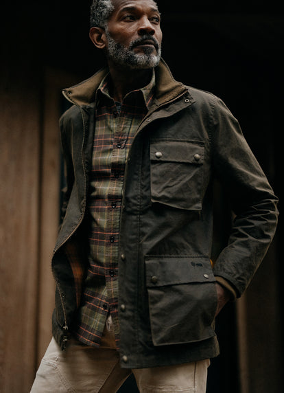 Model wearing The California in Tarnished Brass Plaid and The Clutch Jacket in Waxed Canvas