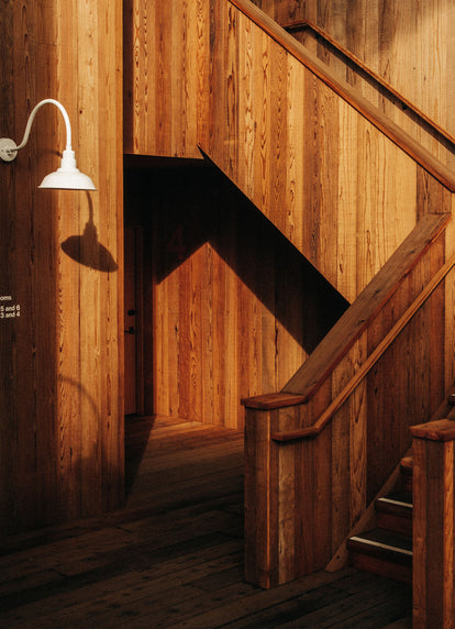 Sunlit wooden staircase at Sea Ranch