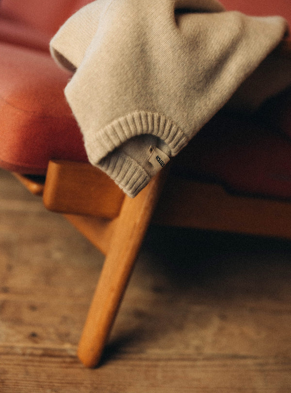 The Eastmoor Sweater, draped over a chair