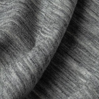 Closeup image of textured merino wool with salt and pepper coloring.