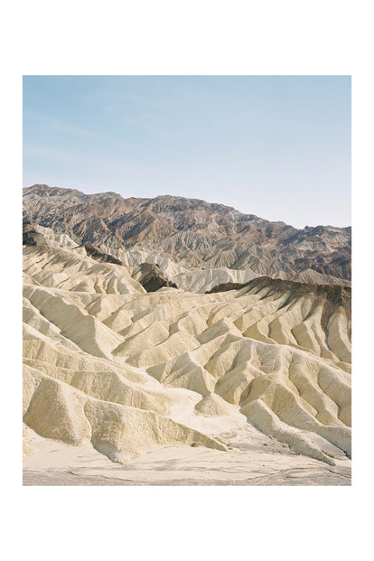 A film photo of desert rock formations