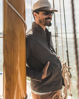Trenton on his boat, Outerwear by Taylor Stitch