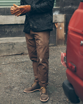Our fit model working on his truck, Pants by Taylor Stitch