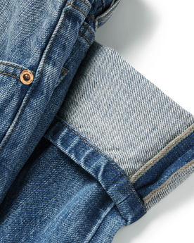 material shot of the cuffs on The Slim Jean in Patch Wash Selvage, Bottoms by Taylor Stitch