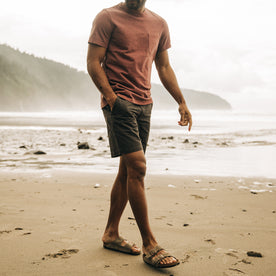 fit model walking on the beach in The Morse Short in Dark Charcoal Linen