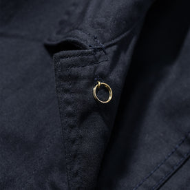 material shot of the interior button on The Ojai Jacket in Indigo