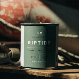 material shot of The Camp Candle in Riptide on a table