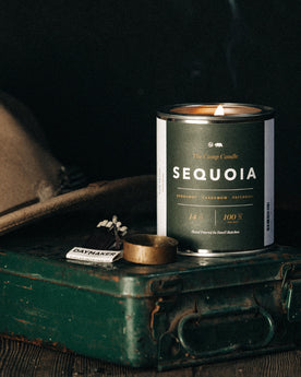 material shot of flatlay of The Camp Candle in Sequoia, Accessories by Taylor Stitch