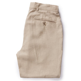 flatlay of The Sheffield Trouser in Natural Linen, shown folded from the back