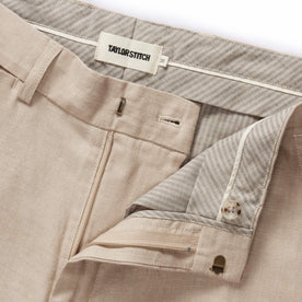 material shot of the hook and bar closure on The Sheffield Trouser in Natural Linen