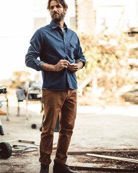 Danny in the chore pants working in his garage, Pants by Taylor Stitch