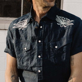 fit model wearing The Embroidered Short Sleeve Western in Indigo Linen