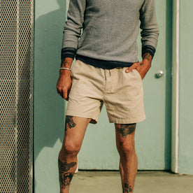model standing in The Après Short in Natural Pinwale
