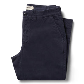 folded flatlay of The Democratic Foundation Pant in Organic Dark Navy