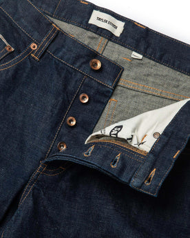 material shot of open button fly of The Democratic Jean in Rinsed Organic Selvage, Bottoms by Taylor Stitch